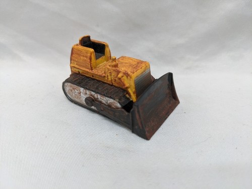 Piccolo bulldozer giallo